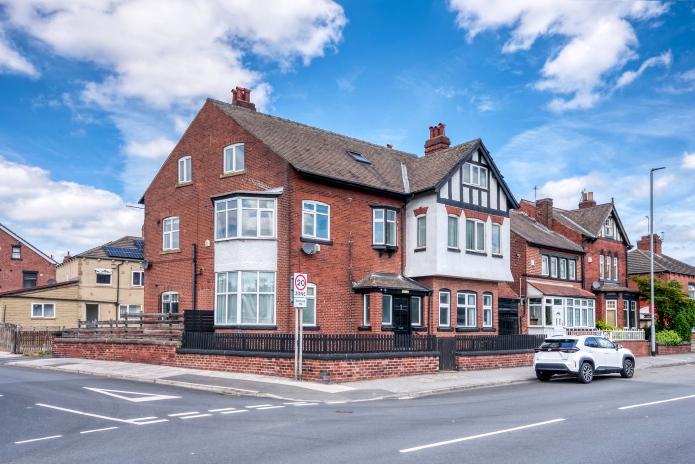 Lonsborough House, a red-brick corner property on East Park Parade, Leeds